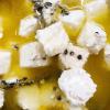 White cheese cubes marinated in olive oil