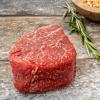 Beef tenderoin on wooden background