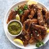 Seven-Spice Roasted Chicken Wings served with S'khug